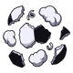 A loose scatter of torn soccer ball debris, black and white leather panel shards and stuffing tufts